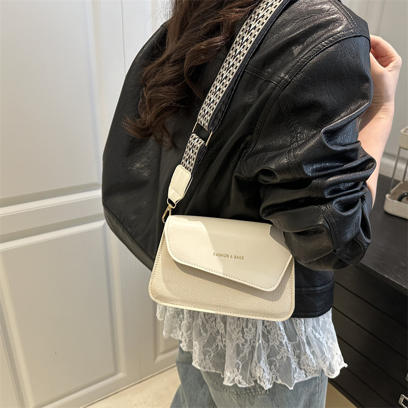 Extremely simple style hand-held small square women's 2025 summer new color blocked wide shoulder strap crossbody bag