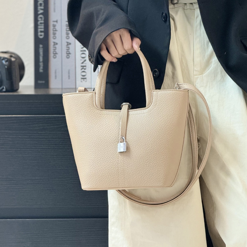 Simple Handheld Bucket Korean Edition Western Style Shoulder Solid Color Commuter Crossover Women's Bag