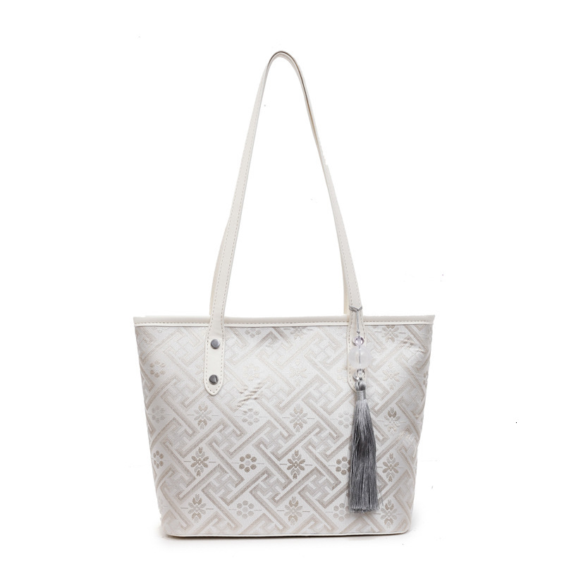New Chinese style plaid hand-held tote women's 2025 summer new large capacity shoulder commuting armpit bag