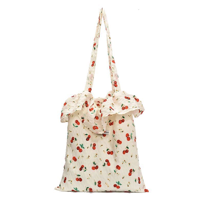 Spring summer new mesh cherry floral large capacity shoulder fairy wind and snow spinning lotus leaf edge hand-held tote bag