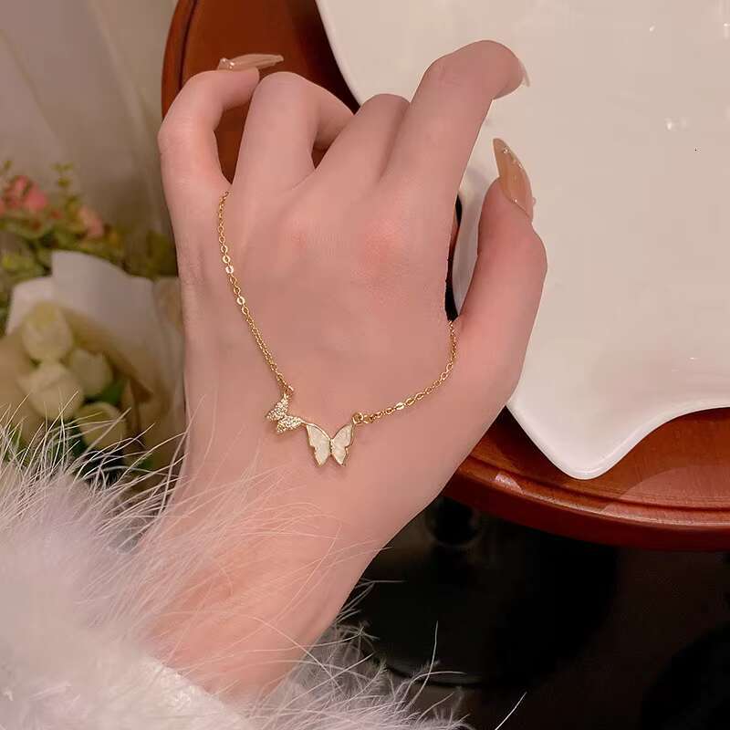 Korean version of light butterfly titanium steel necklace for women, simple trendy pendant, personalized and fashionable collarbone chain