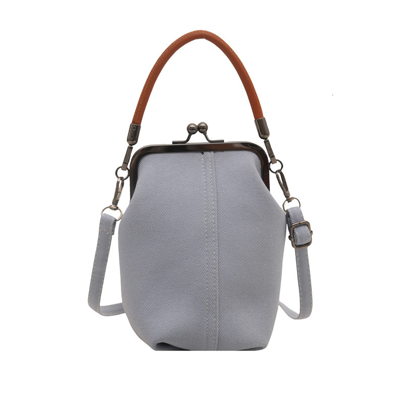 Korean style hand-held small square women's 2025 summer new item niche light luxury shoulder internet famous trendy crossbody bag