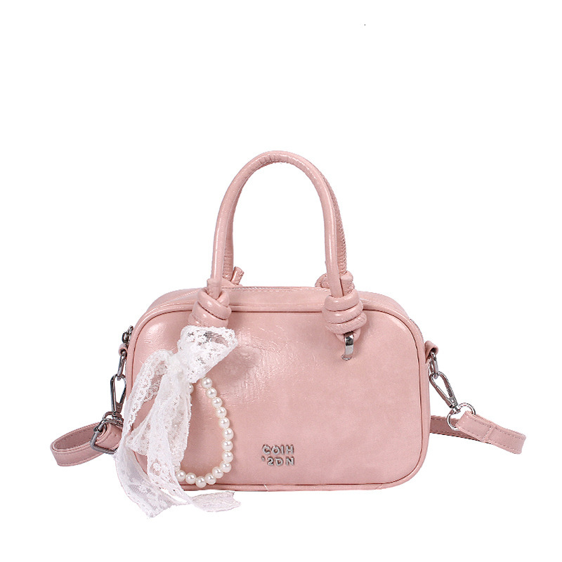 Light luxury hand-held small square women's 2025 summer new style temperament versatile shoulder internet famous trendy crossbody bag