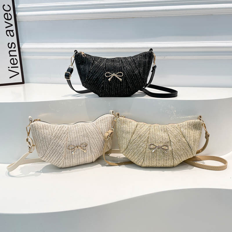 Bow woven crescent women's 2025 summer new style pleated versatile shoulder internet famous trend crossbody bag