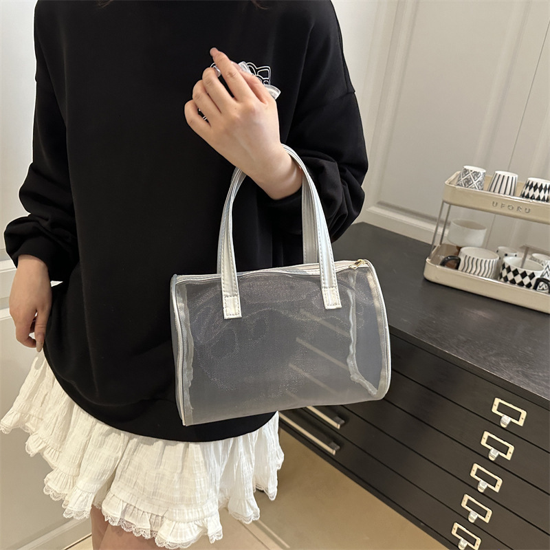 Portable hand-held small square women's 2025 summer high-end makeup popular trend storage bag