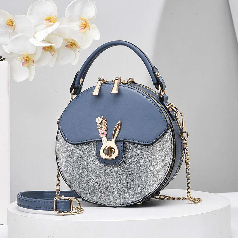 2025 new internet celebrity chain contrasting small round mini hand-held shoulder bag, diagonal cross women's bag