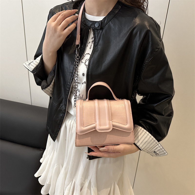 Simple hand-held small square women's 2025 summer new style light luxury western-style shoulder commuting crossbody bag