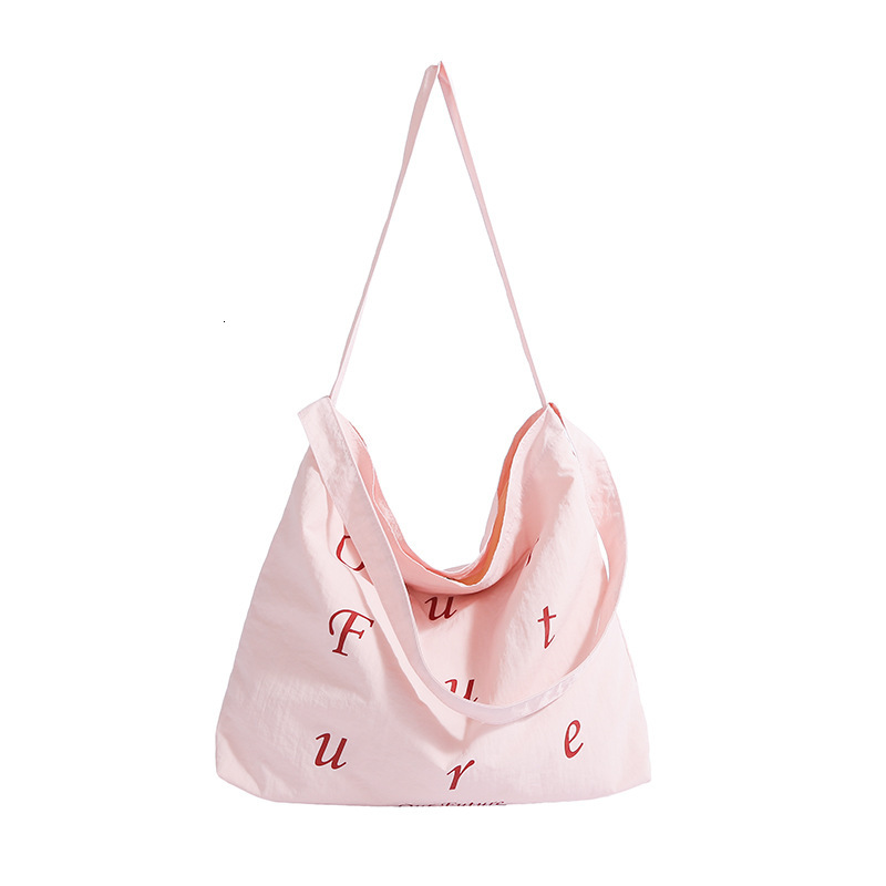 Fashion niche hand-held tote women's 2025 summer new large capacity shoulder trendy versatile crossbody bag