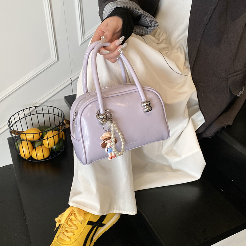 High end niche design small square for women 2025 summer new fashion handbag commuting simple shoulder bag