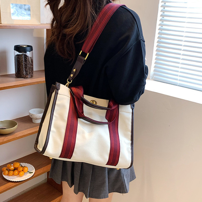 2025 New Women's Shoulder Bag Designer Slant Canvas Fashion Handbag Large Capacity Contrastive Color Niche Trend Crossbody Bag Casual Shopping Ba