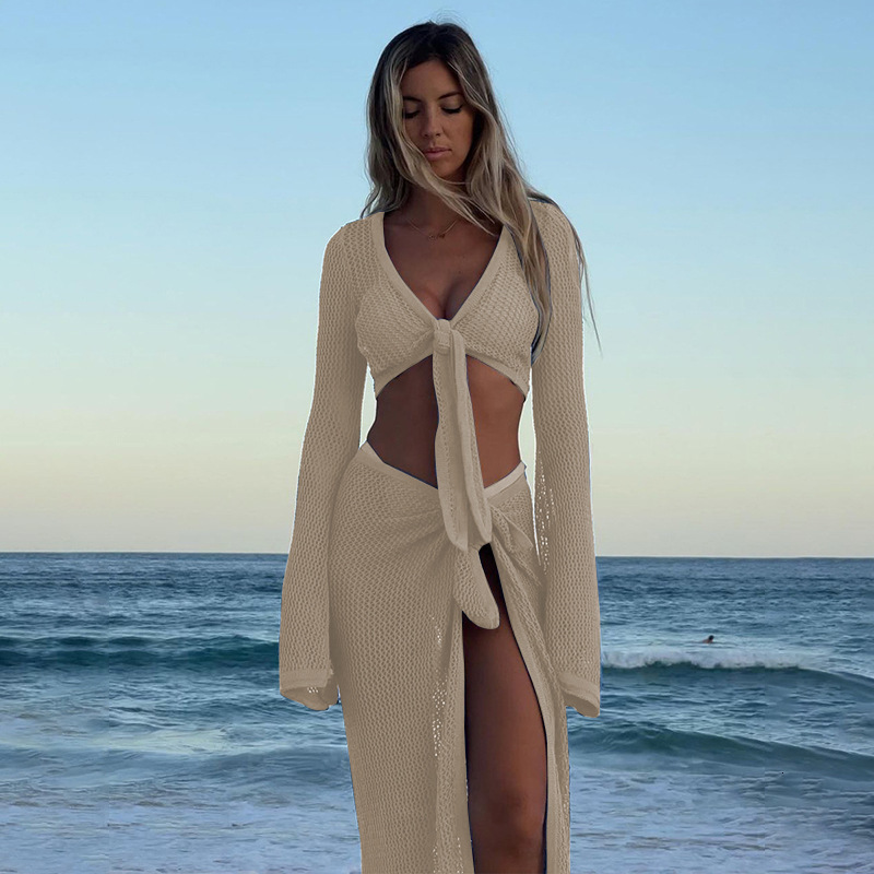 Hollow out long sleeved knitted two-piece short top beach tied skirt set womens dress set