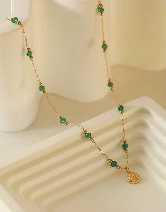 Fashionable women's jewelry gold-plated fashionable stainless steel shell pendant necklace