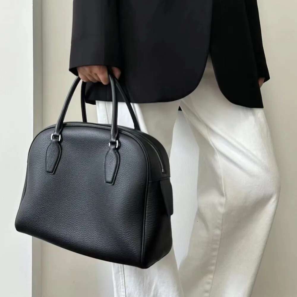 VOAETEC Niche High-end Women's New Leather First Layer Cowhide Large-capacity Bowling Portable Large Bag Commuting