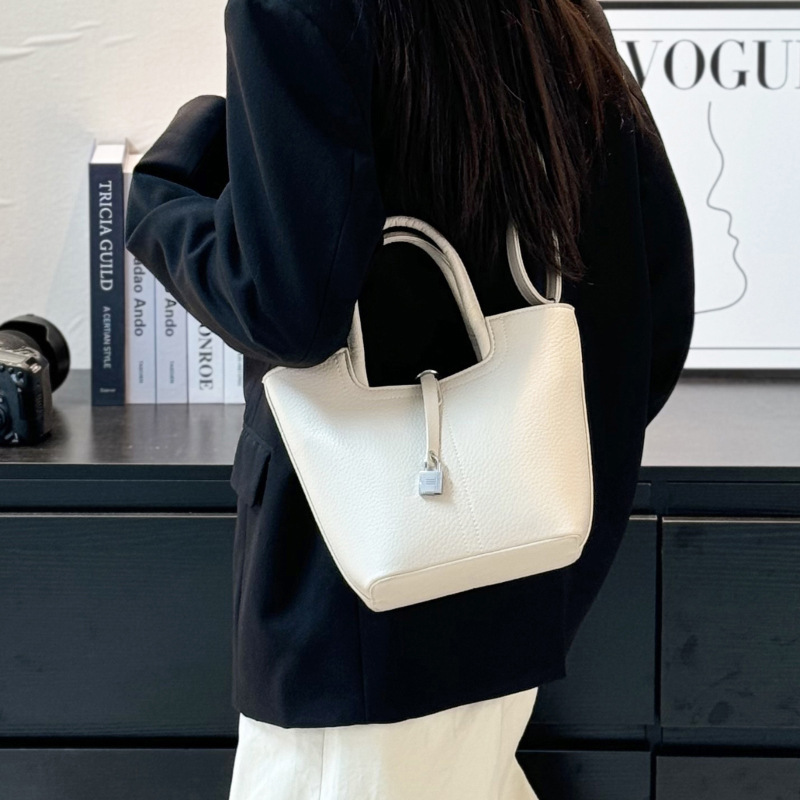 Simple Handheld Bucket Korean Edition Western Style Shoulder Solid Color Commuter Crossover Women's Bag