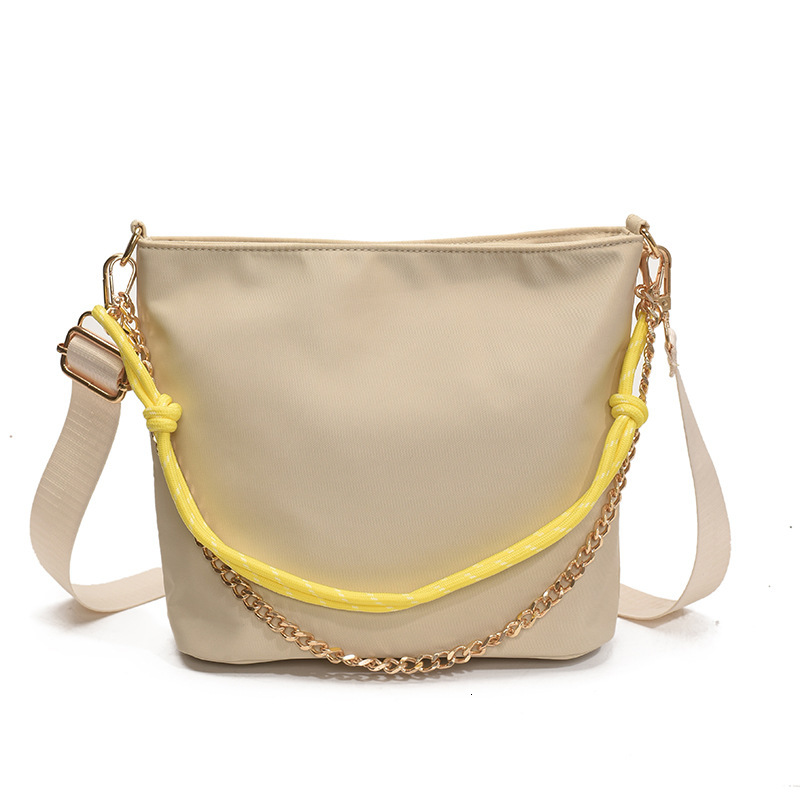 Fashionable and simple hand-held small square women's 2025 summer new item commuting versatile shoulder casual crossbody bag