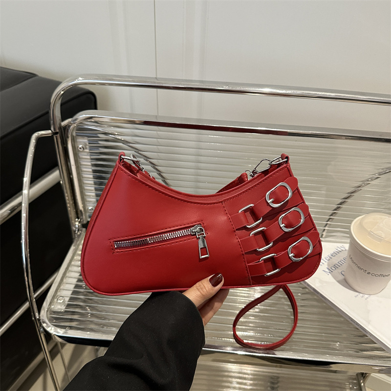 Small niche design hand-held baguette women's 2025 summer new item light luxury western-style shoulder commuting crossbody bag