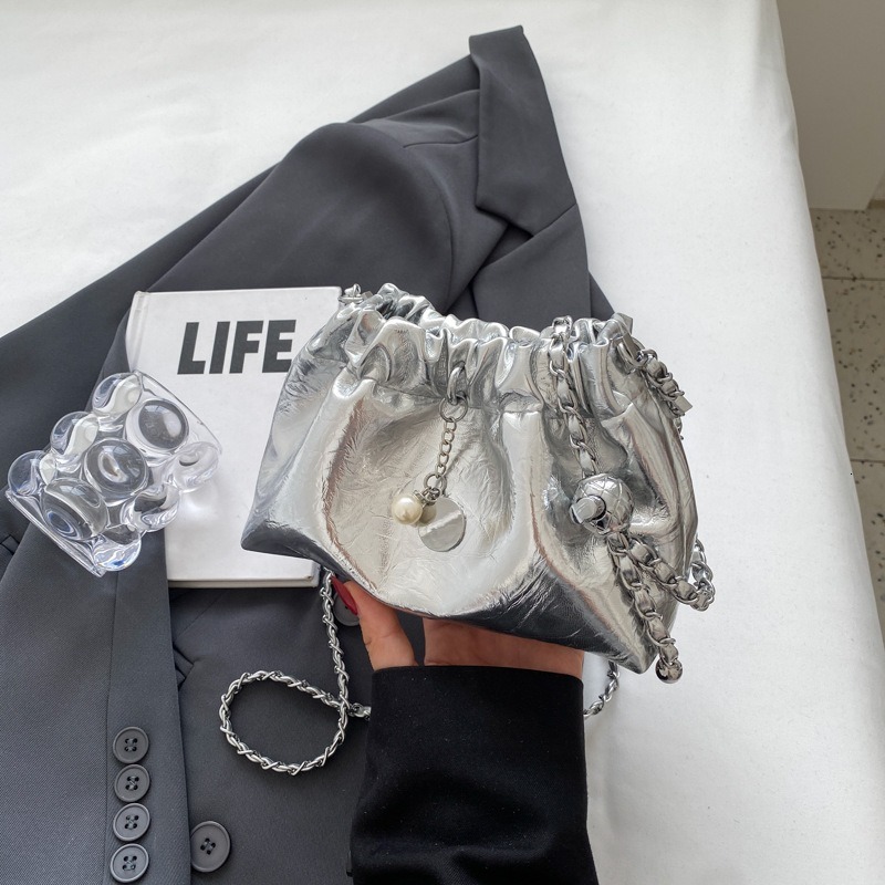 2025 new bag summer niche multifunctional diagonal chain designer women's new silver drawstring bucket bag cloud bag