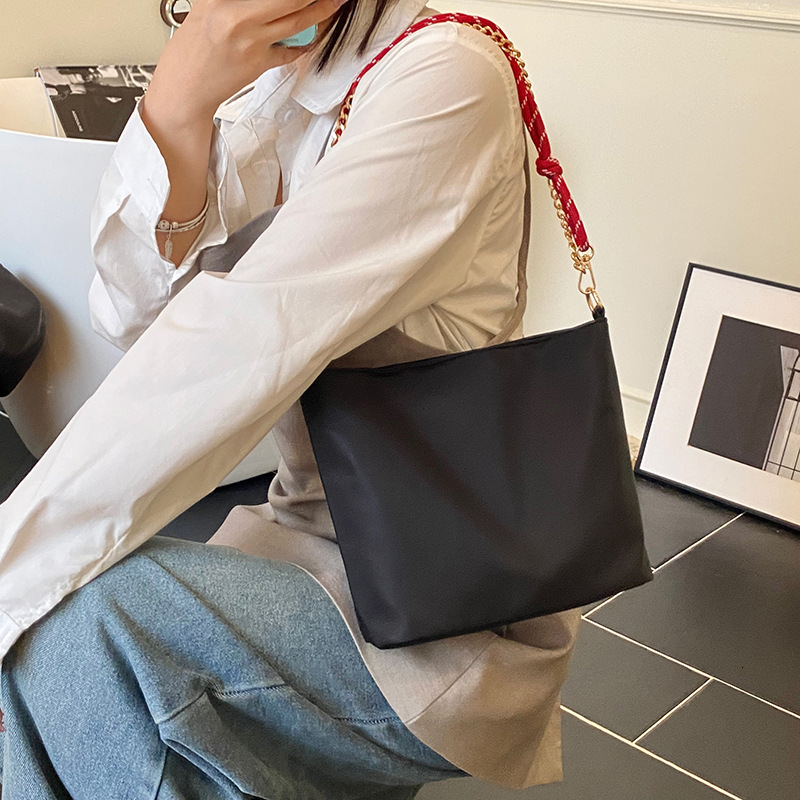Fashionable and simple hand-held small square women's 2025 summer new item commuting versatile shoulder casual crossbody bag