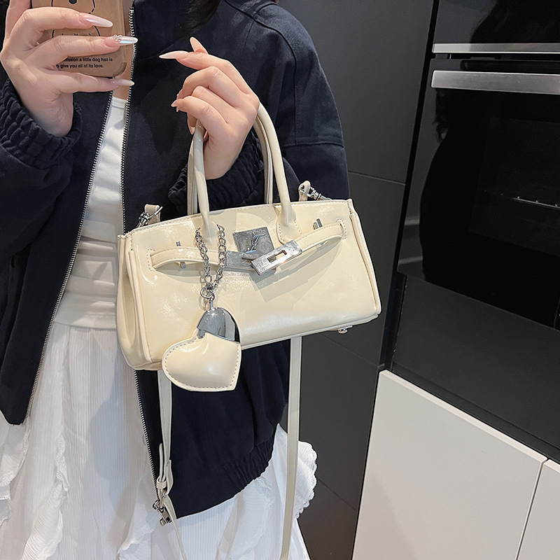 2025 summer new niche design handbag fashionable commuting shoulder crossbody high-end sense bag