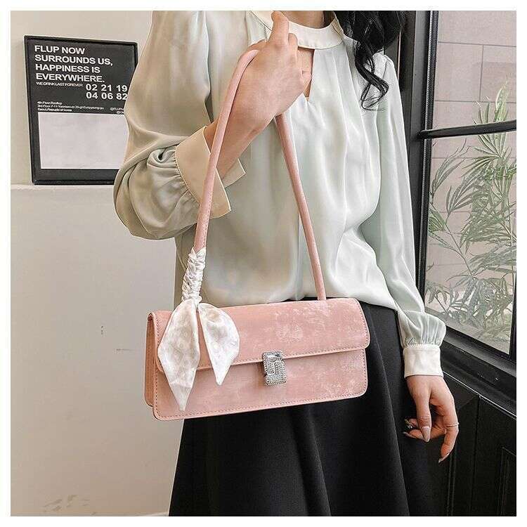 Advanced and stylish silver for women 2025 new French versatile single shoulder armpit bag fashionable hand-held stick bag