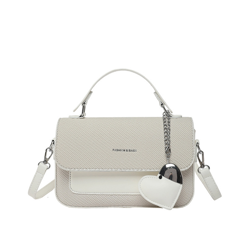 Fashion hand-held small square women's 2025 summer new style light luxury western-style shoulder commuting versatile crossbody bag