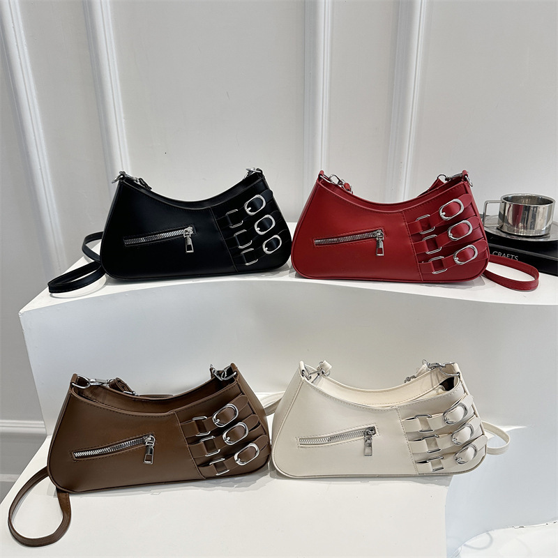 Small niche design hand-held baguette women's 2025 summer new item light luxury western-style shoulder commuting crossbody bag