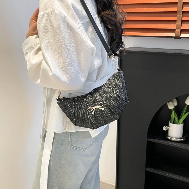 Bow woven crescent women's 2025 summer new style pleated versatile shoulder internet famous trend crossbody bag