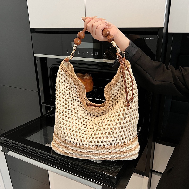 Beach vacation straw for women's 2025 summer new commuting shoulder crossbody bag, hollowed out woven tote bag