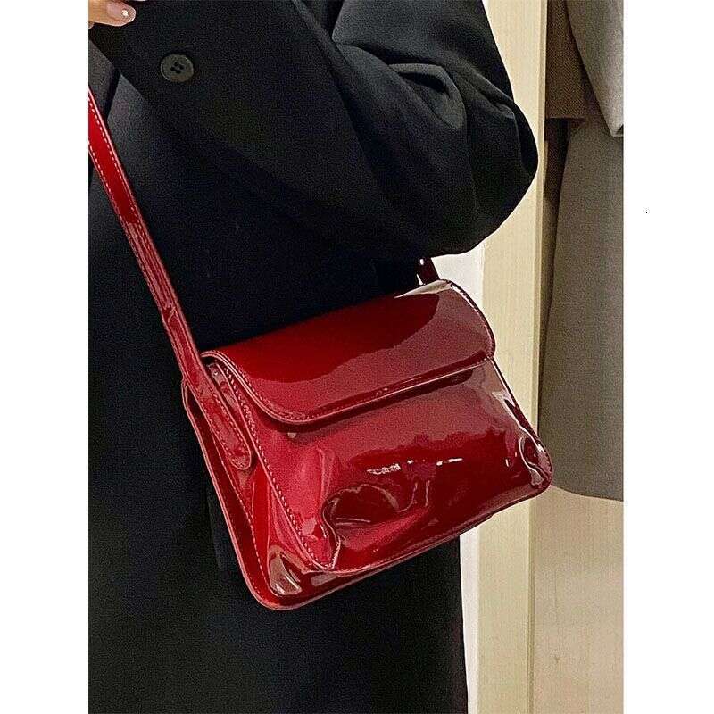 Red patent leather small armpit 2025 new fashionable and versatile square hand-held shoulder crossbody bag