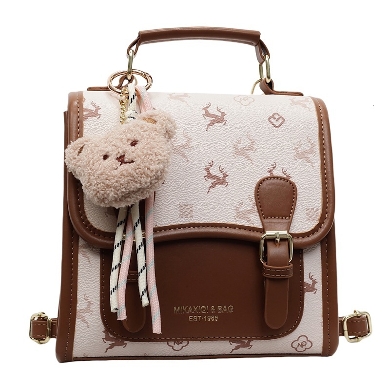 Korean version contrasting color hand-held small square women's 2025 summer new light luxury shoulder bag multifunctional backpack