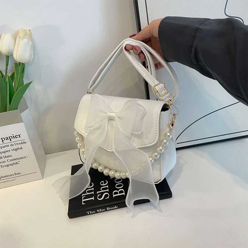 ddmy PU Solid Color Leather Pearl Chain Bow Knot Fashion Top-Handle Women Canvas Large Armpit Shoulder Bag