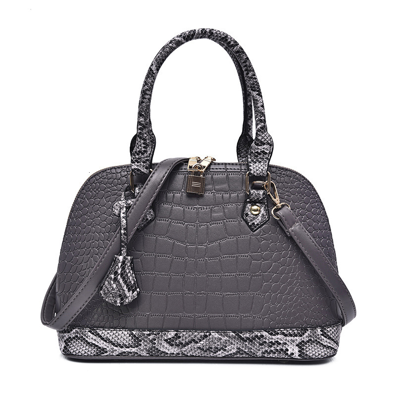 Designer Pack Women S Autumn And Winter New Fashion Crossbody Handbag Snake Skin Shell Bag Free Shipping