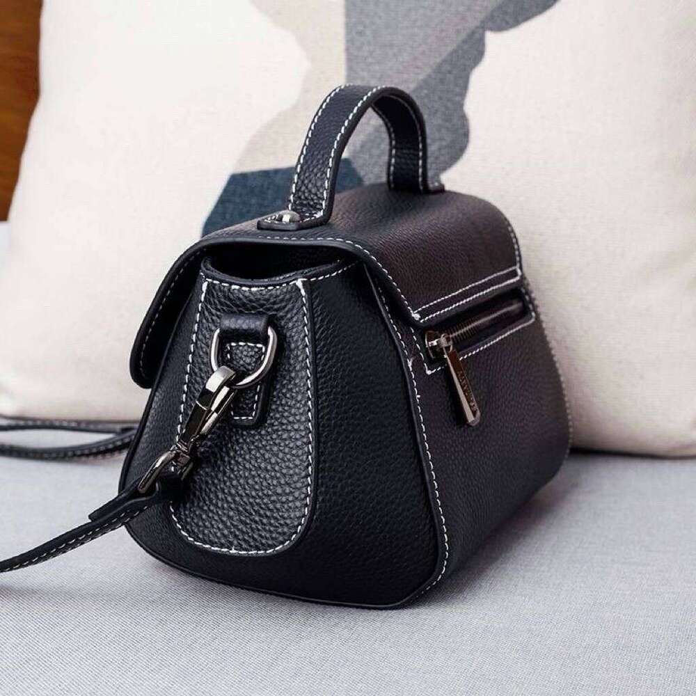First layer cowhide women's 2025 new genuine leather shoulder crossbody large capacity handheld commuting light luxury small bag