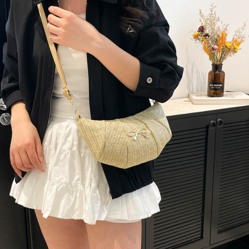 Bow woven crescent women's 2025 summer new style pleated versatile shoulder internet famous trend crossbody bag