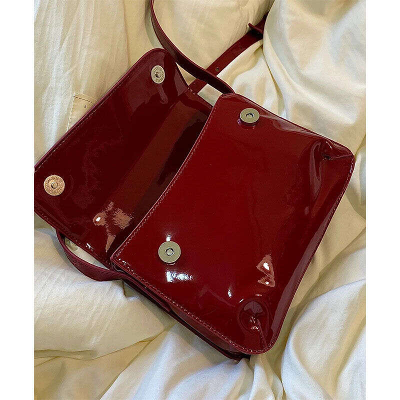 Red patent leather small armpit 2025 new fashionable and versatile square hand-held shoulder crossbody bag