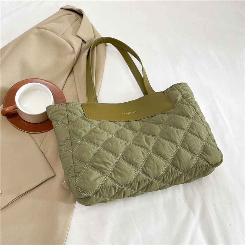 New Style Free Delivery Designer Bag Autumn And Winter Large Capacity Class Commuting High End Tote Women's New Down Texture Niche Versatile Sing
