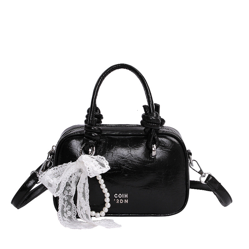 Light luxury hand-held small square women's 2025 summer new style temperament versatile shoulder internet famous trendy crossbody bag