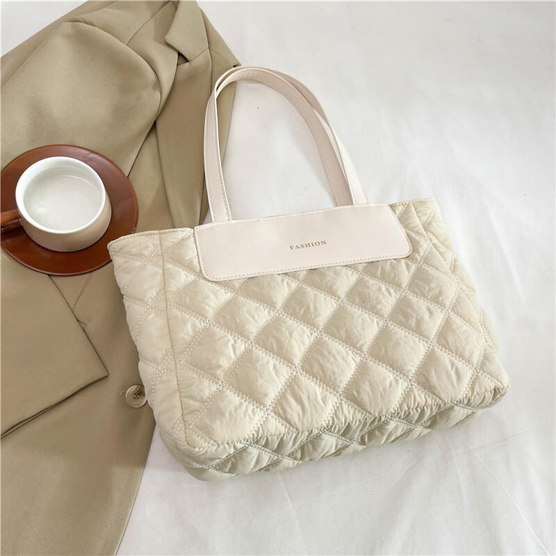 New Style Free Delivery Designer Bag Autumn And Winter Large Capacity Class Commuting High End Tote Women's New Down Texture Niche Versatile Sing
