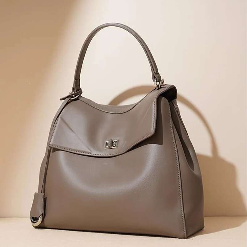 New Women's Backpack Sier Lock Cowhide Handbag Soft Fashion Niche Design Brand Tote Classic High-End Shoulder Bag