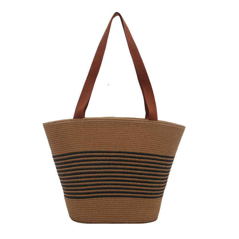 Fashion contrasting straw woven hand-held bucket women's 2025 summer new versatile shoulder casual armpit bag