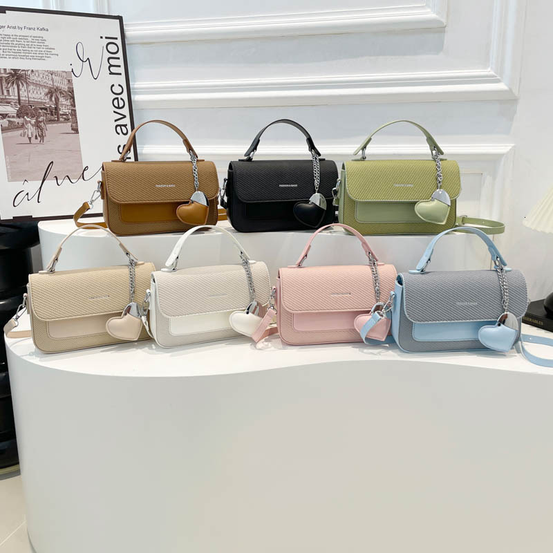 Fashion hand-held small square women's 2025 summer new style light luxury western-style shoulder commuting versatile crossbody bag
