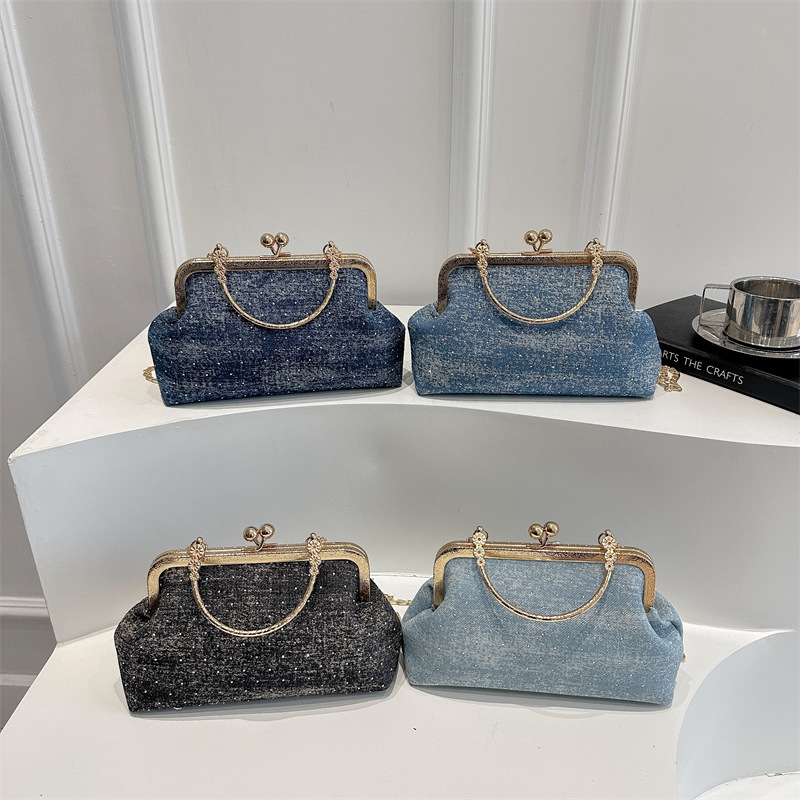 Fashion metal hand-held cheongsam women's 2025 summer new pearl light luxury shoulder chain crossbody bag