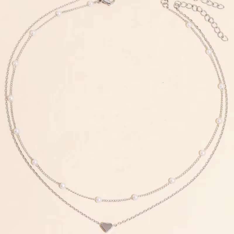 Hot selling imitation pearl heart-shaped pendant necklace, versatile collarbone chain, women's double-layer layered necklace