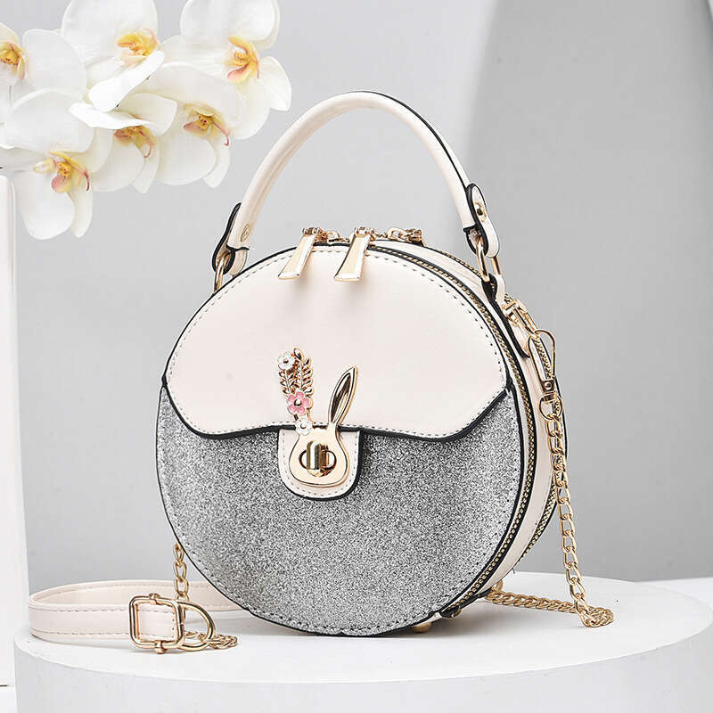 2025 new internet celebrity chain contrasting small round mini hand-held shoulder bag, diagonal cross women's bag