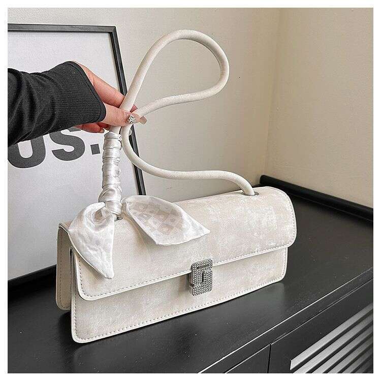 Advanced and stylish silver for women 2025 new French versatile single shoulder armpit bag fashionable hand-held stick bag