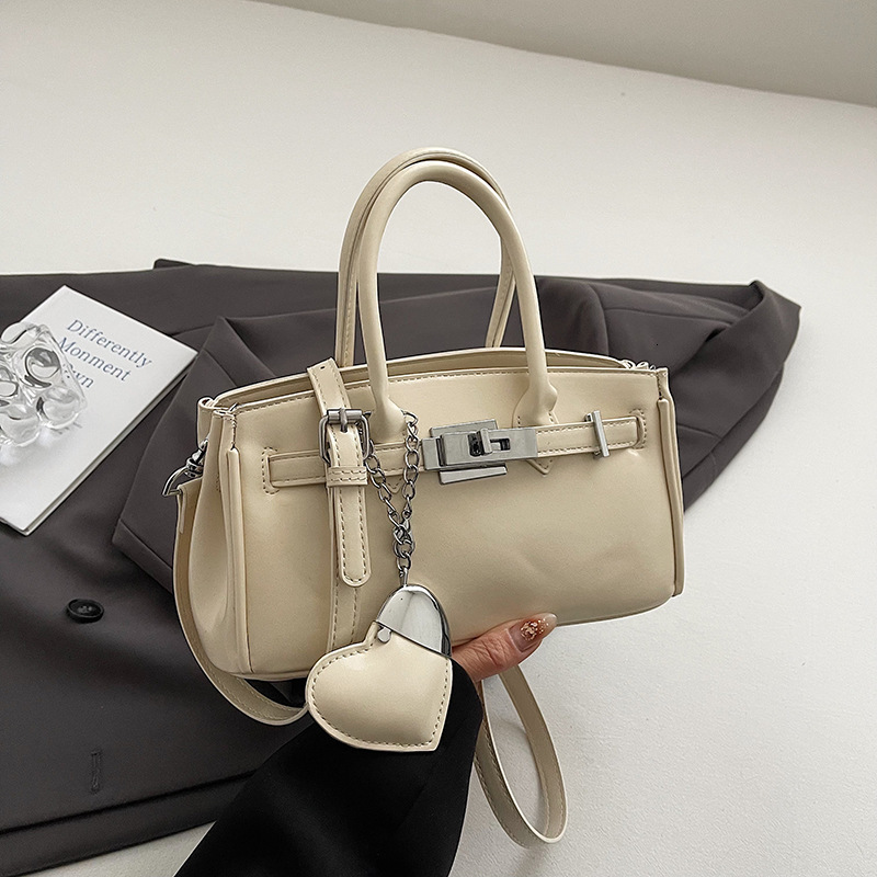 2025 summer new niche design handbag fashionable commuting shoulder crossbody high-end sense bag