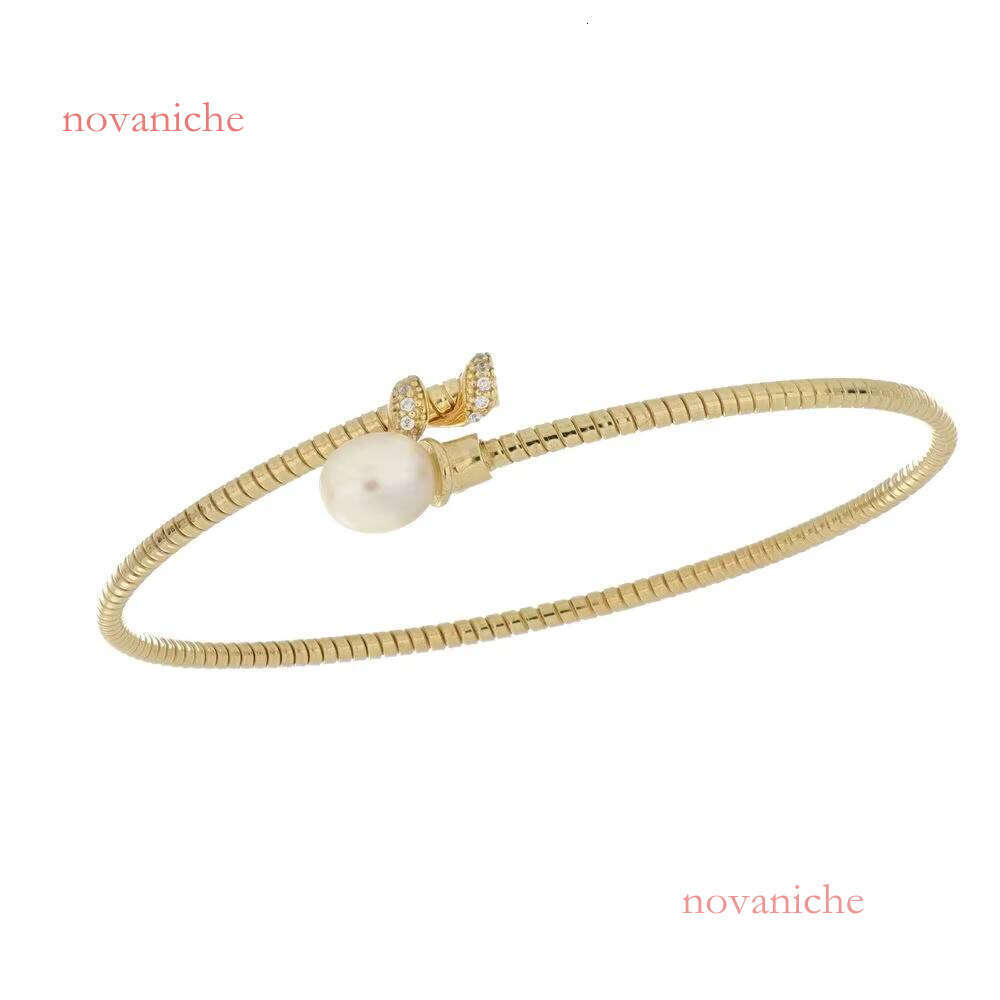An old bracelet made in Italy, featuring sparkling pearls and exquisite paving details