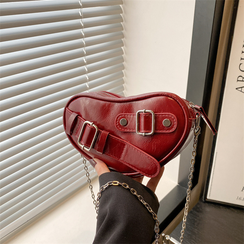 Small and high-end hand-held love women's 2025 summer new fashion versatile shoulder trendy armpit bag