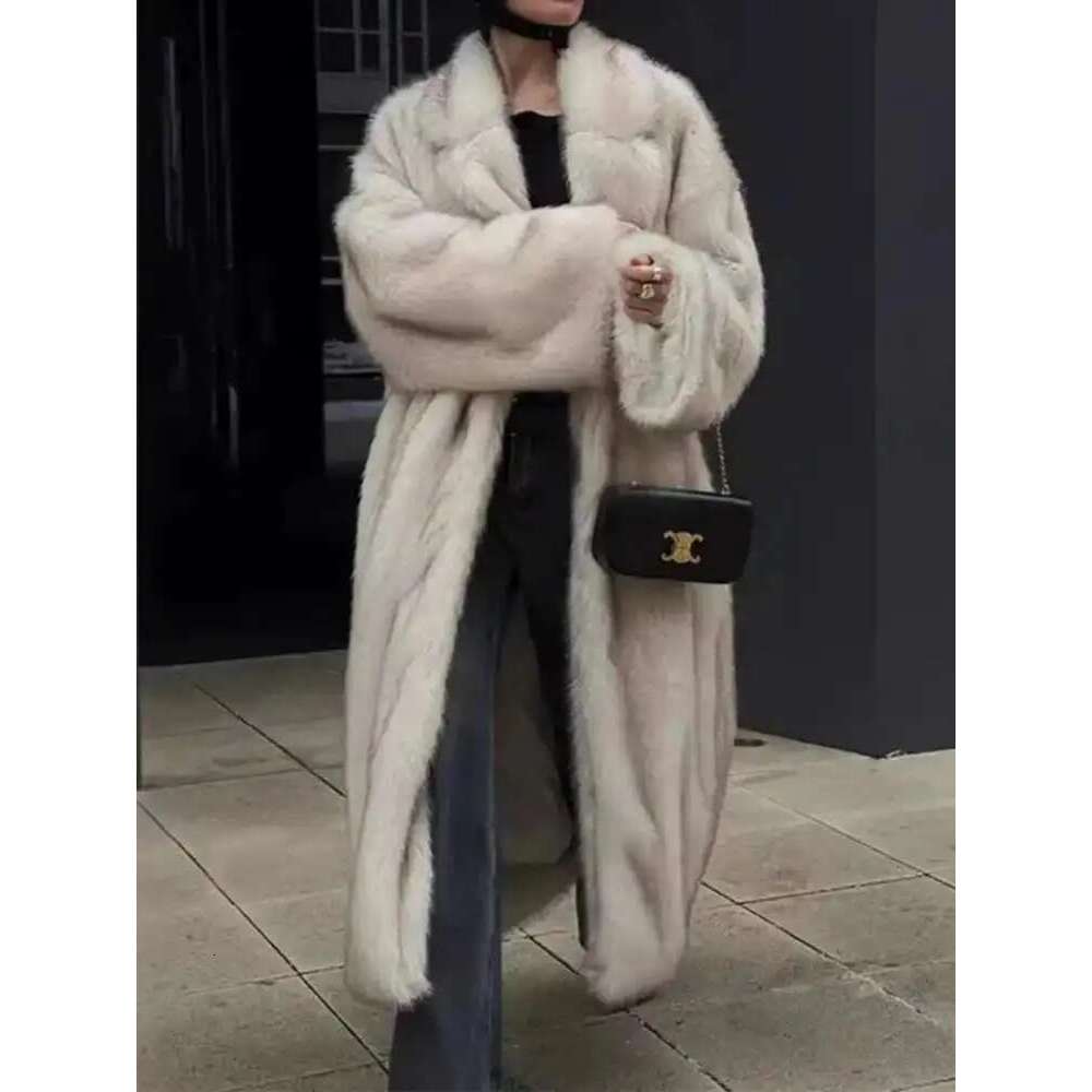 UCXQ Tide Faux Fur Coat European Style Street All Match Lapel Temperament Elegant Long Outerwear Women 2025 Autumn Winter 3C2587 Designer