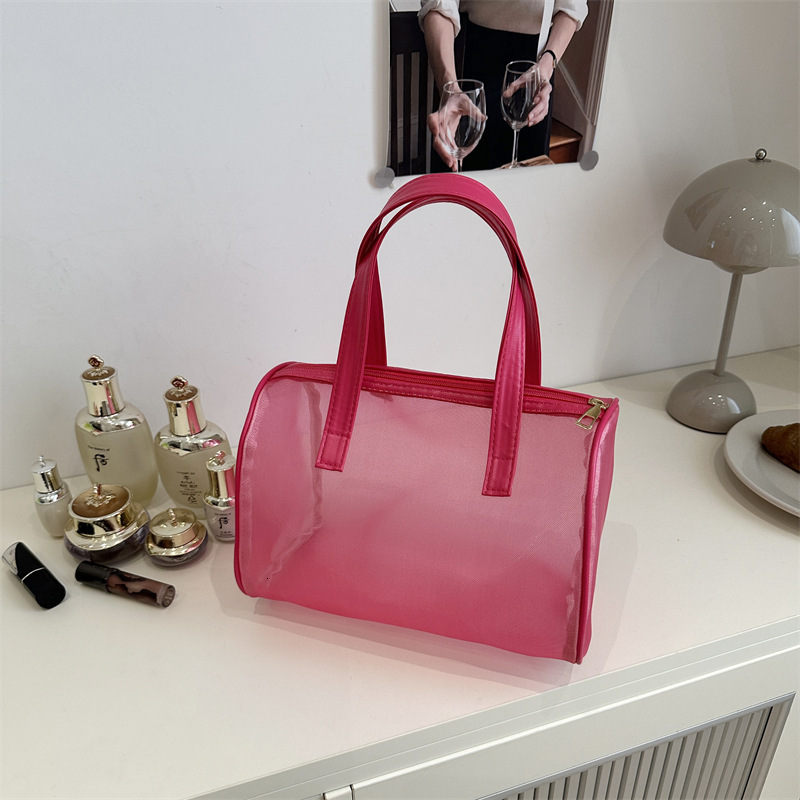 Portable hand-held small square women's 2025 summer high-end makeup popular trend storage bag